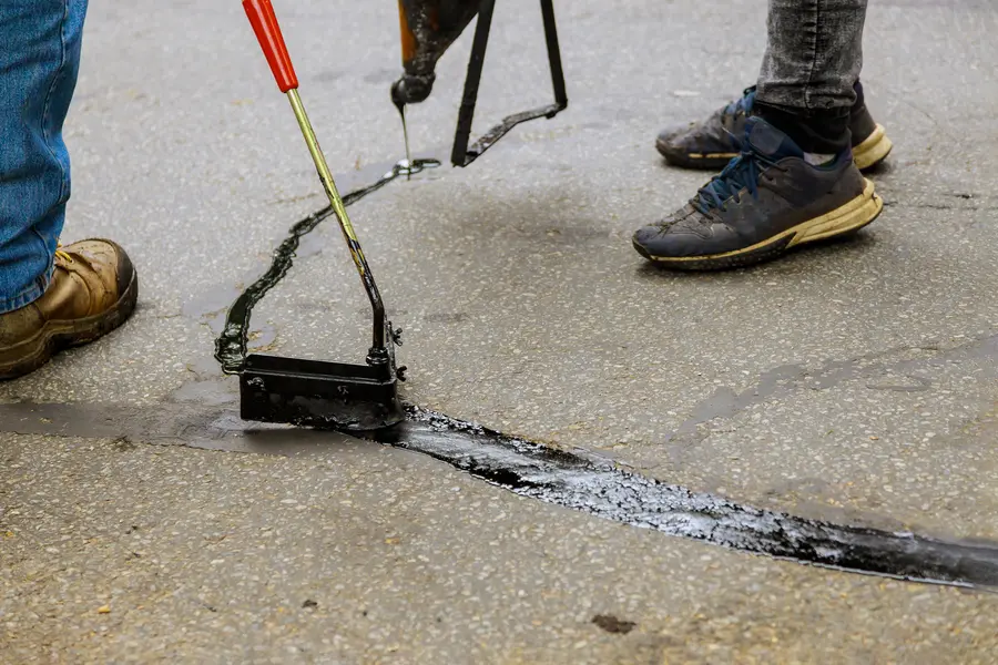 How Sealcoating Protects Asphalt From Cracks And Wear Duluth, GA
