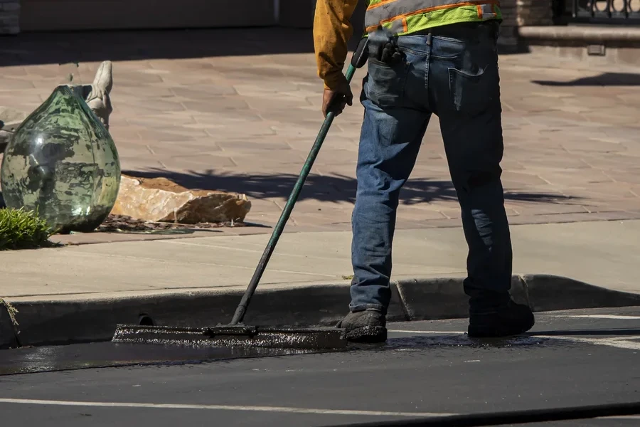How Sealcoating Protects Asphalt From Cracks And Wear in Duluth, GA